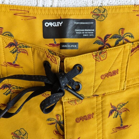 Oakley Men's Size 34 Board Shorts Swim Trunks Spellout Orange Yellow - Picture 2 of 9